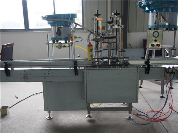 เครื่องบรรจุน้ำขวด 24 หัว